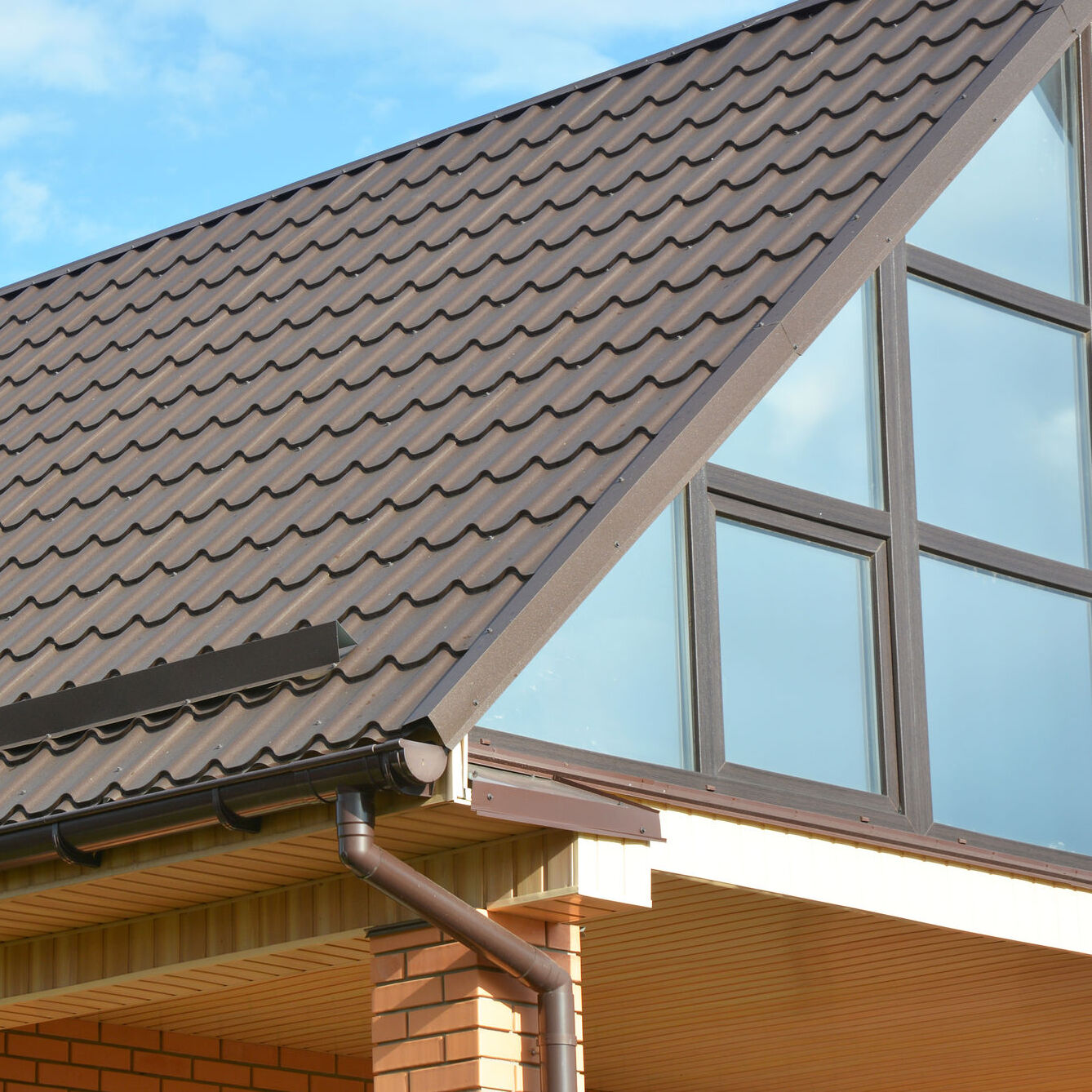 metal-roofing with rain gutters